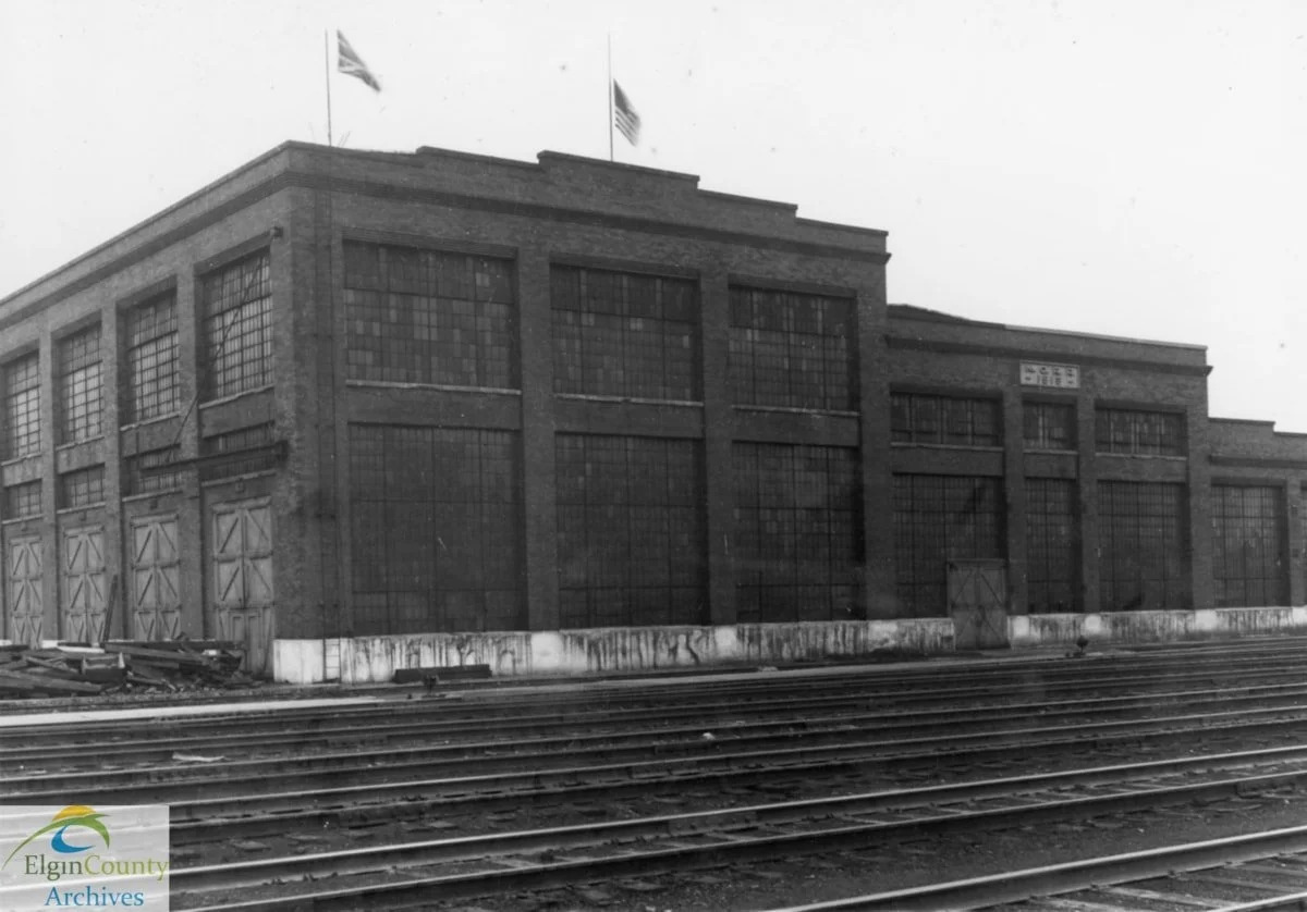 Archival photo of the Shops and railway lands